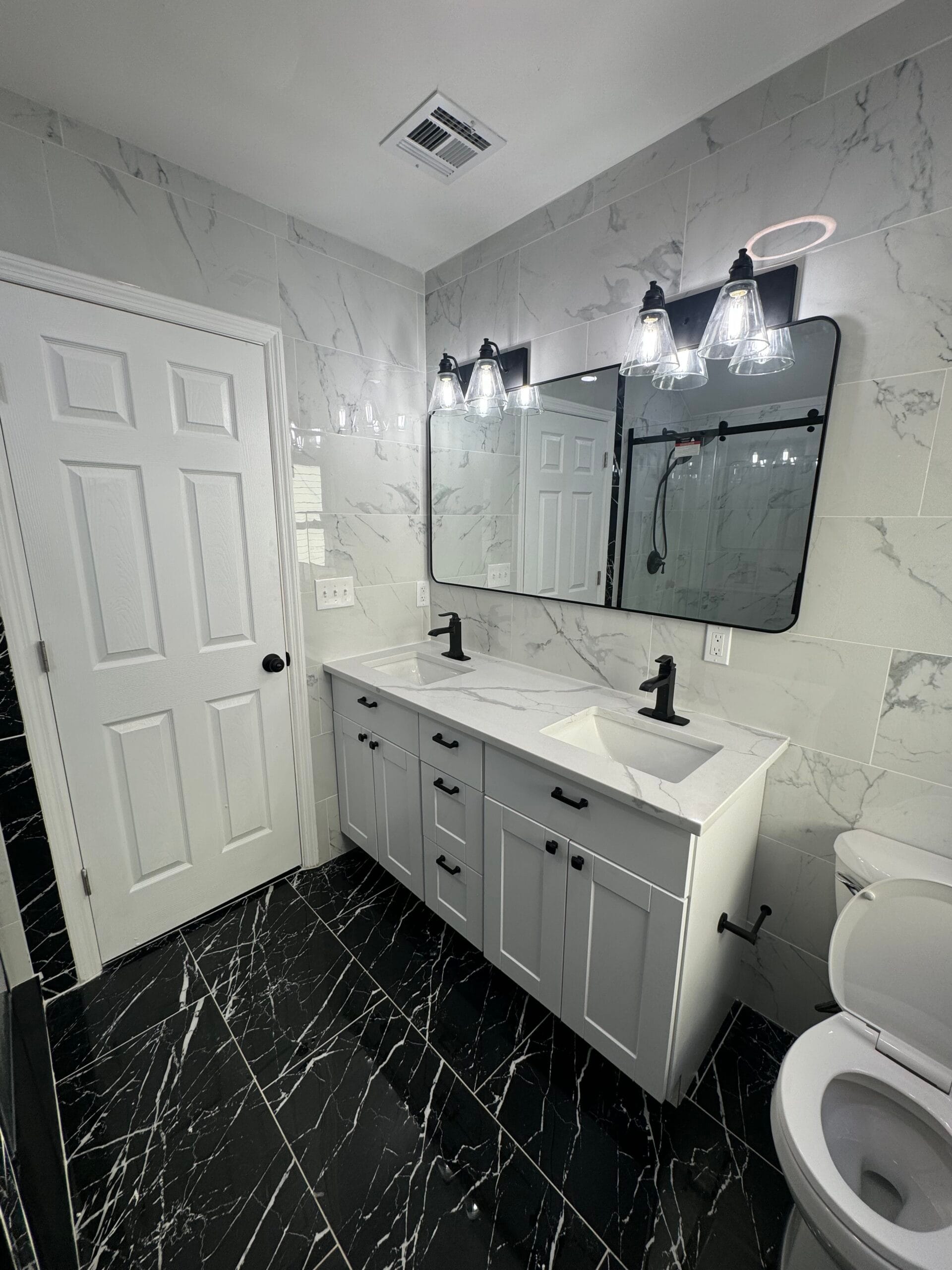 Englewood bathroom renovation detail with new tile work and fixtures