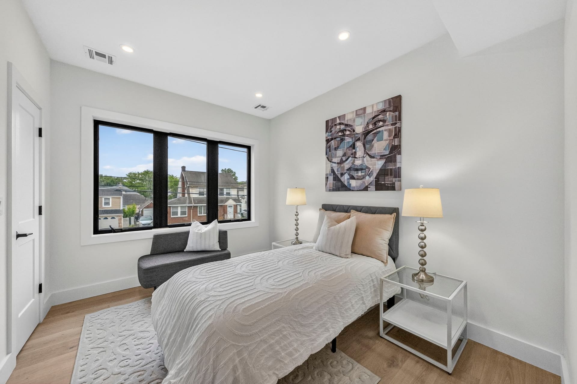 Bedroom with a street-facing window and a reading nook