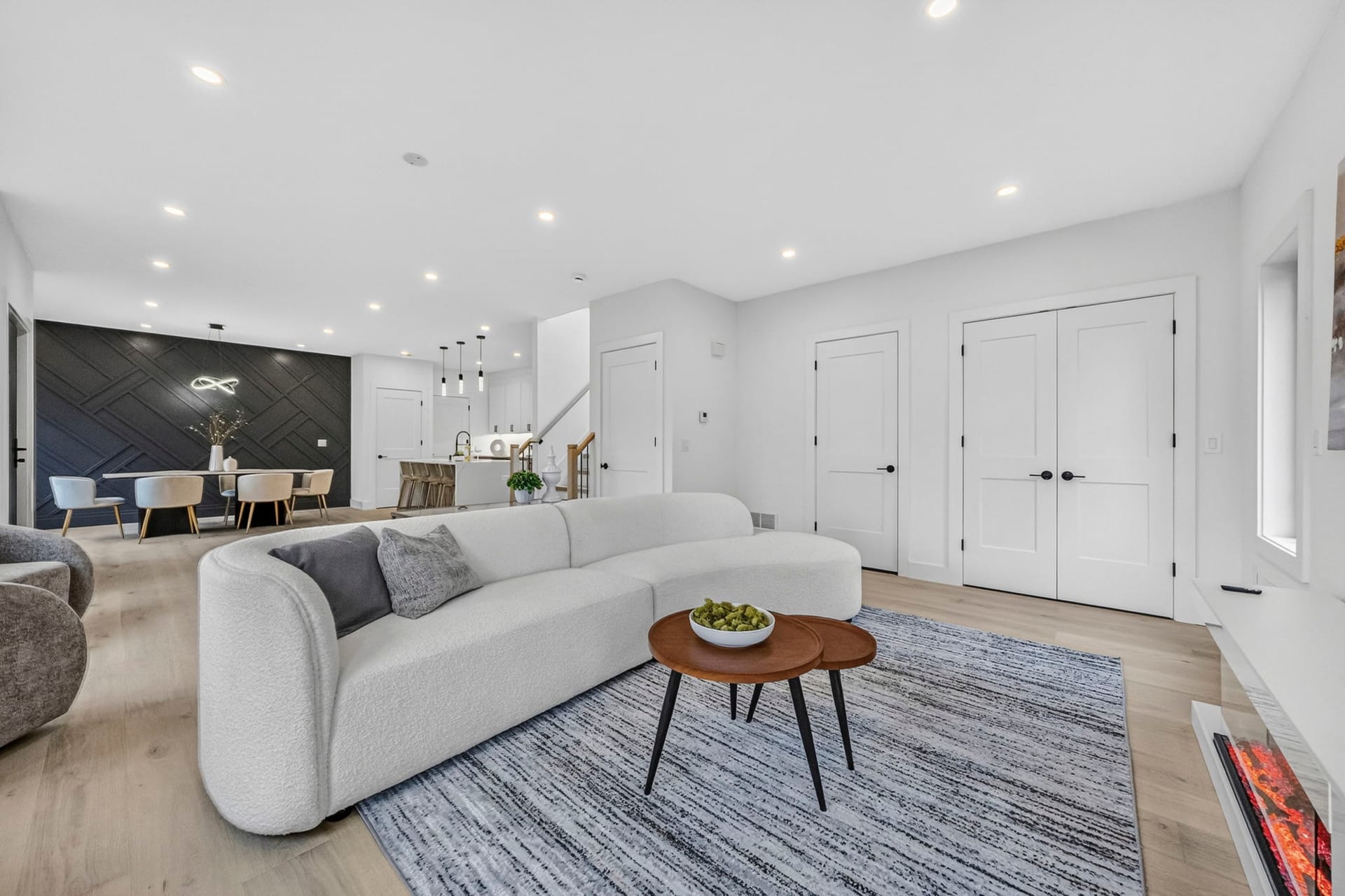 Family room open to the dining area and staircase